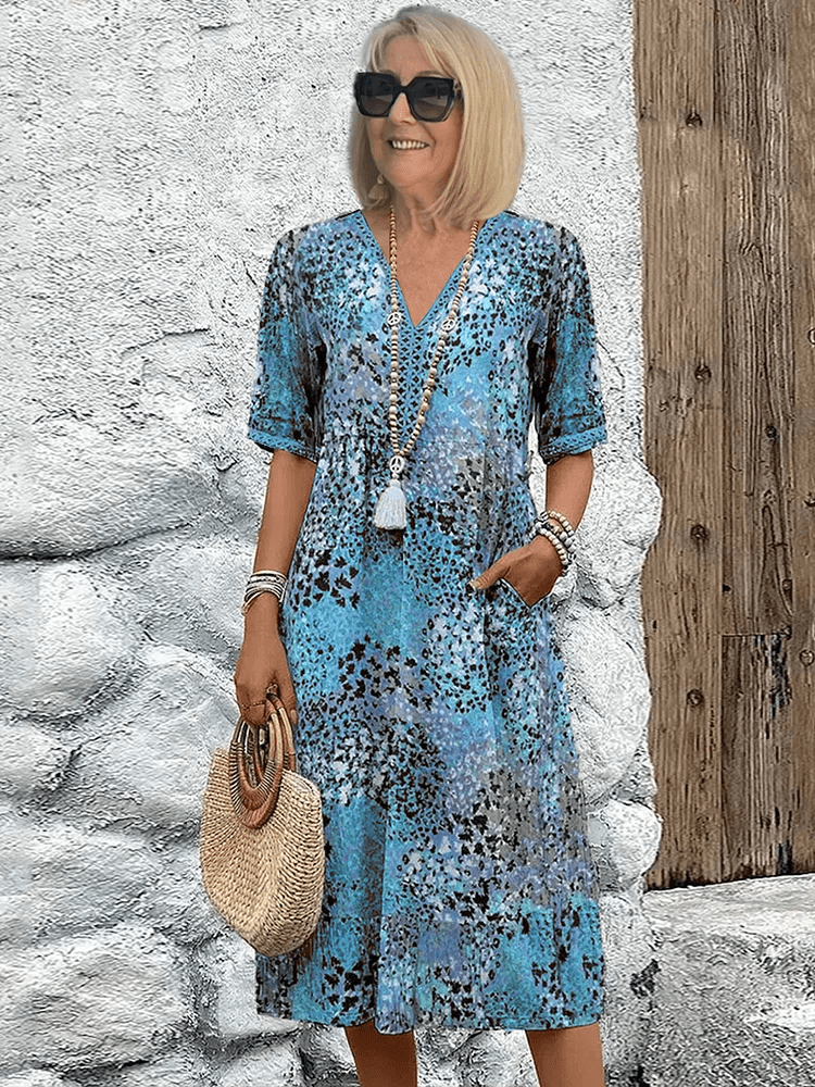 Léonie™ | Robe mi-longue vibrante